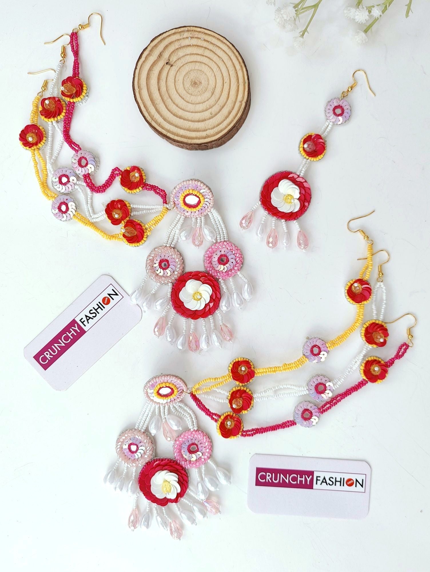 Handcrafted pink-white floral beaded jewellery set ideal for brides at haldi-mehndi functions