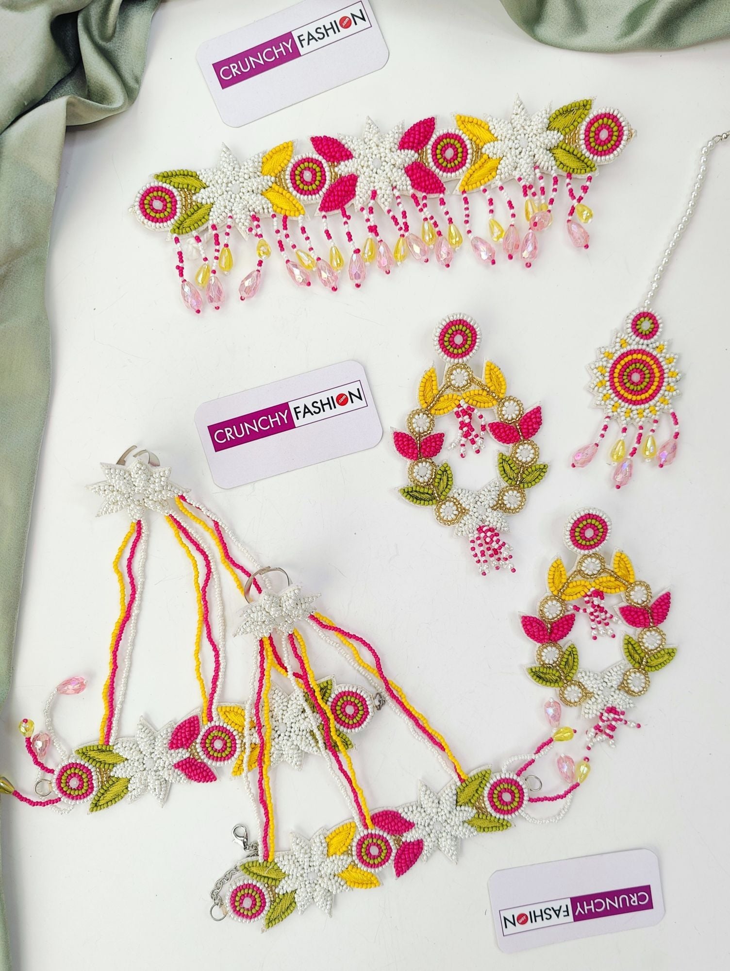 Handmade pink, light pink floral beaded jewelry set for haldi-mehndi ceremony, ideal for women and girls.