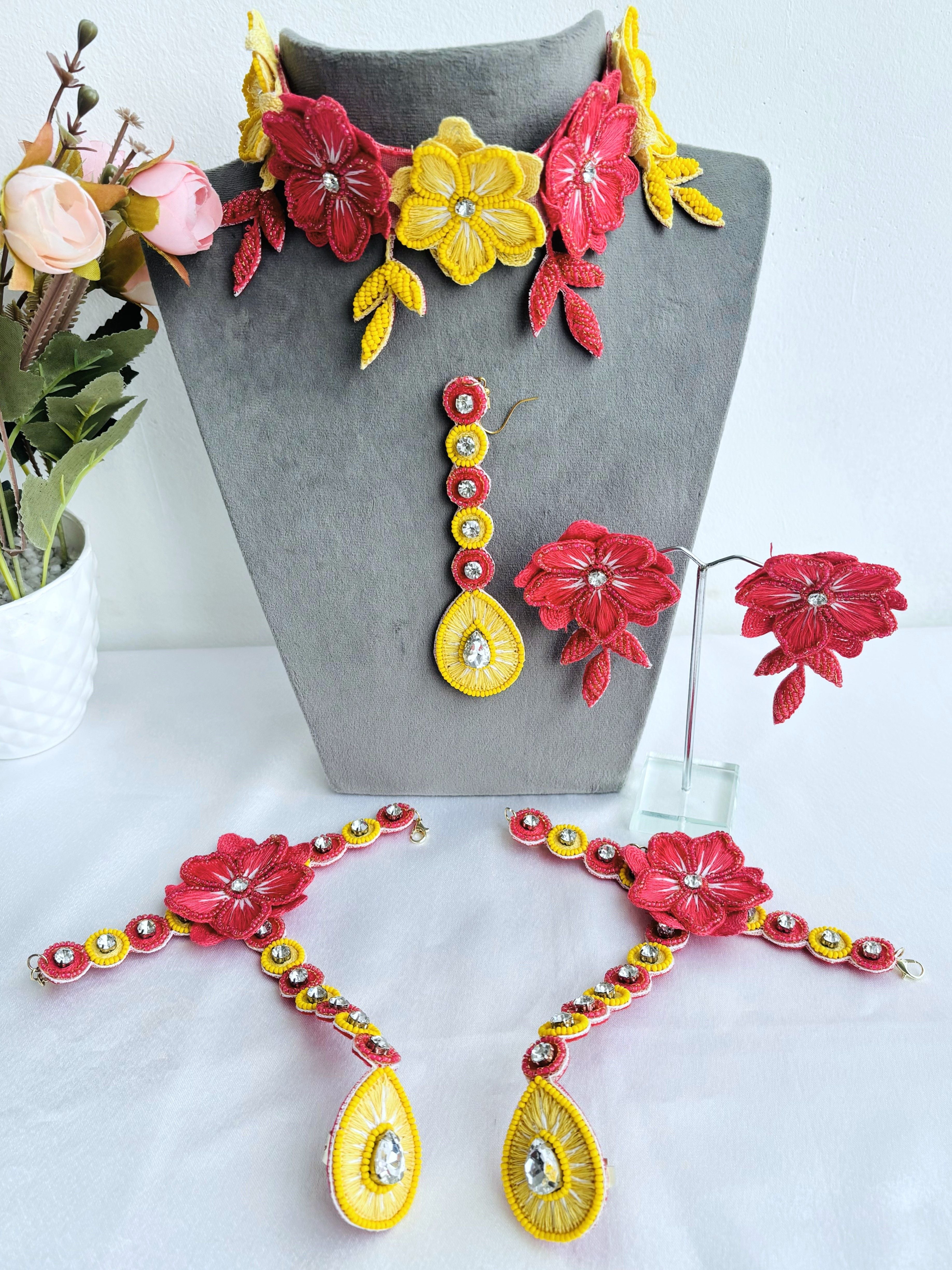 Handmade pink-yellow floral jewellery set ideal for haldi-mehndi