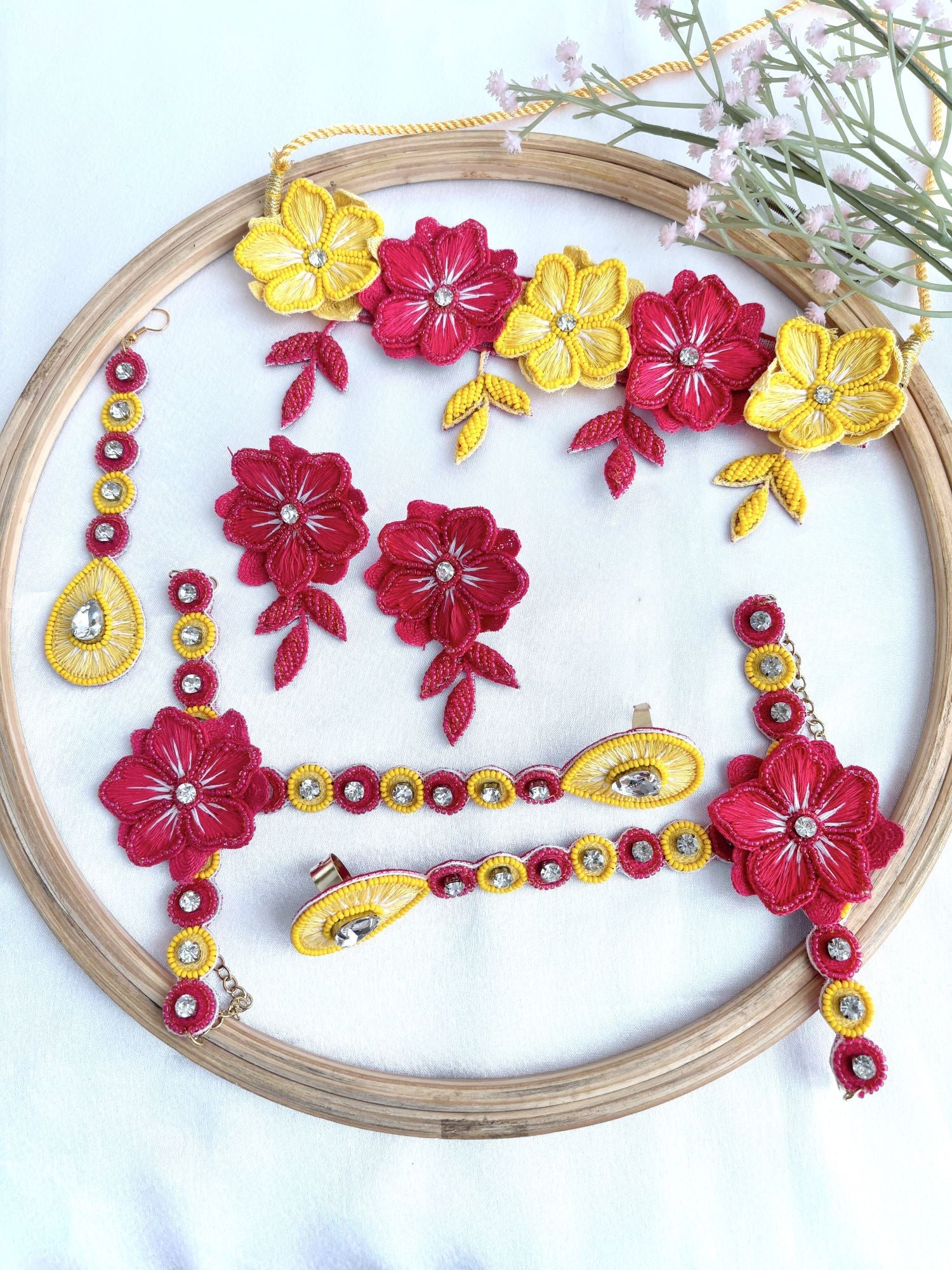 Handmade pink-yellow floral jewellery set ideal for haldi-mehndi