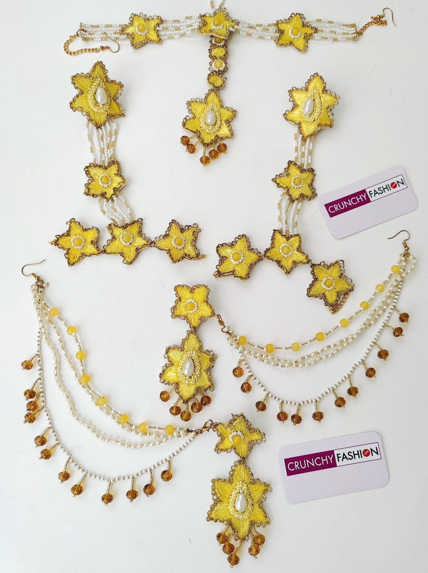 Handcrafted yellow sunflower bridal jewellery set, including necklace, earrings, maang tika and hathphools for haldi ceremony