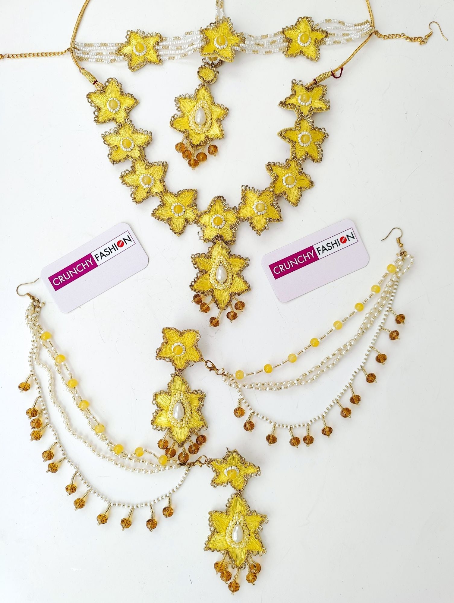 Handcrafted yellow sunflower bridal jewellery set, including necklace, earrings, maang tika and hathphools for haldi ceremony