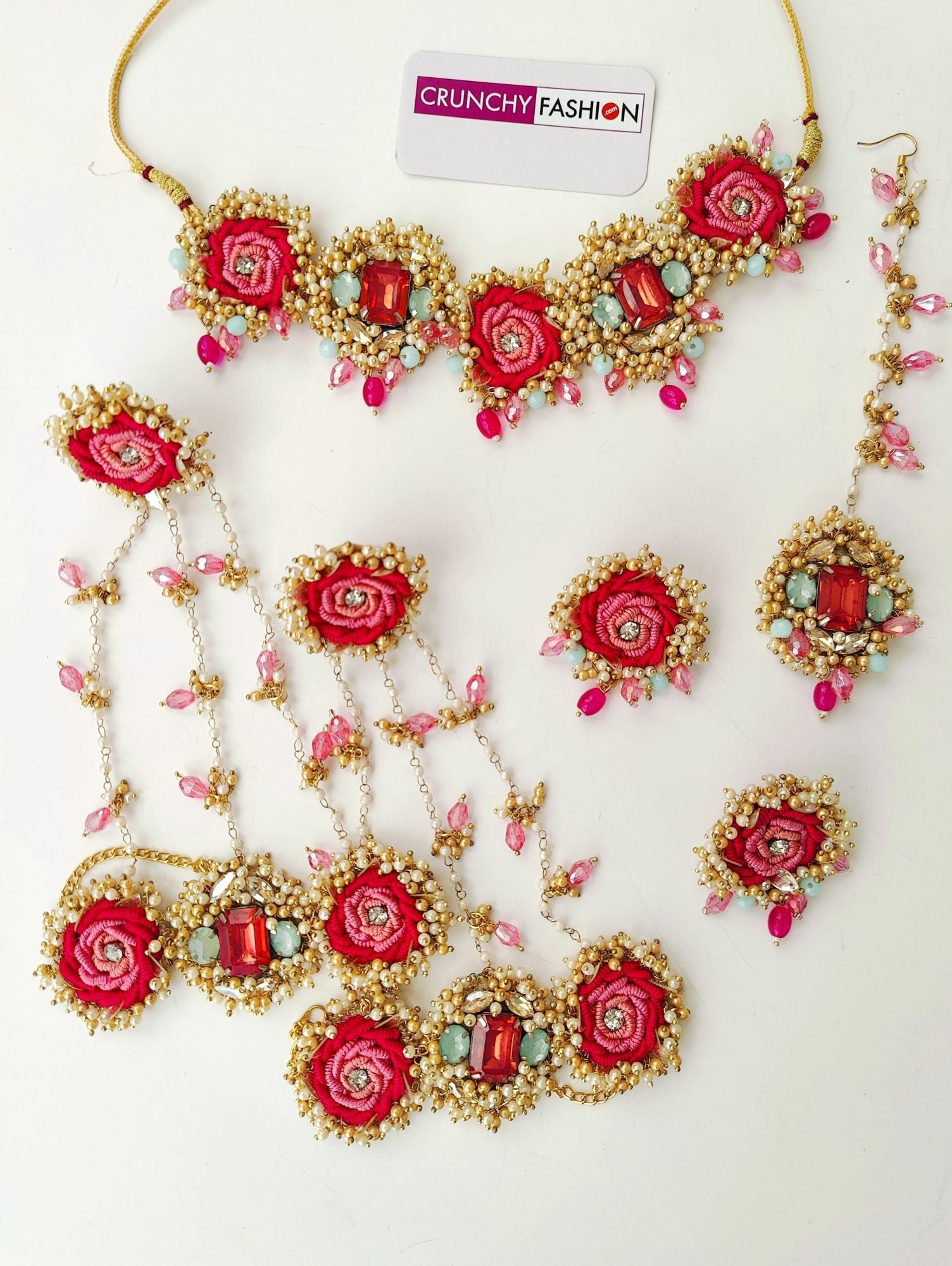 Handmade pink floral beaded jewellery set, ideal for haldi-mehndi, wedding, and festive parties.