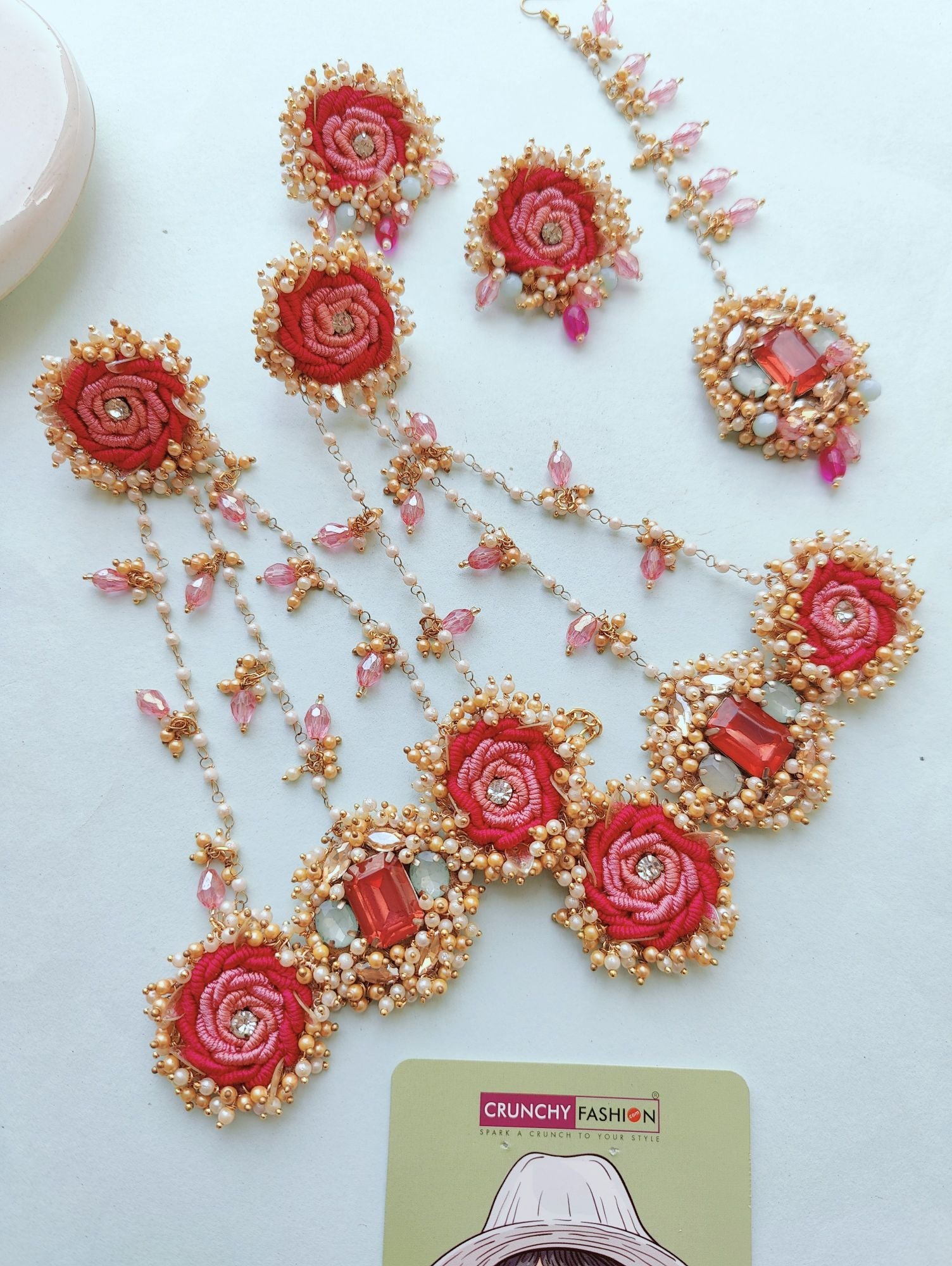 Handmade pink floral beaded jewellery set, ideal for haldi-mehndi, wedding, and festive parties.