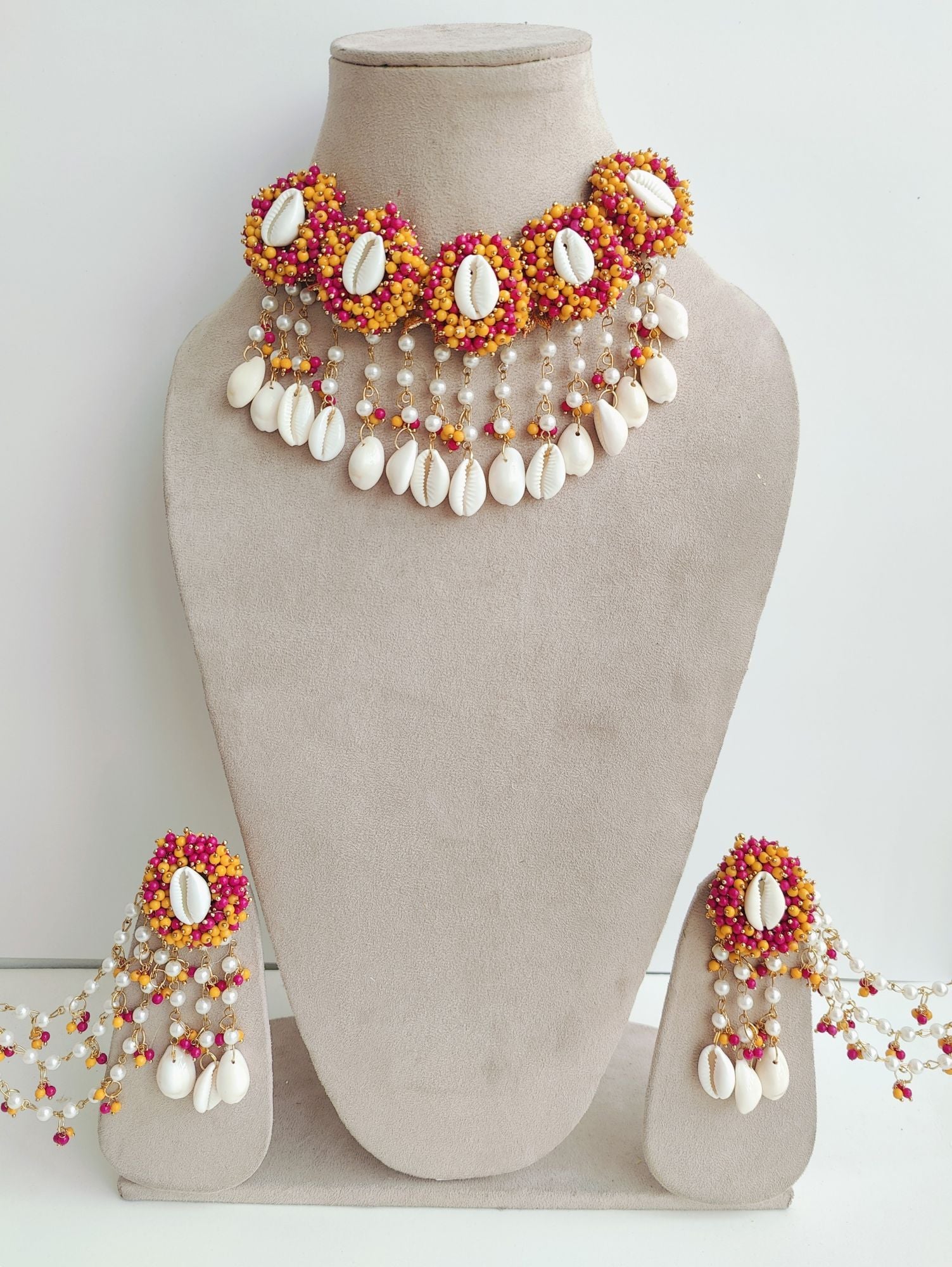 Haldi Mehndi set in orange with seashell & flower designs for women & girls, for festivals, weddings, engagements