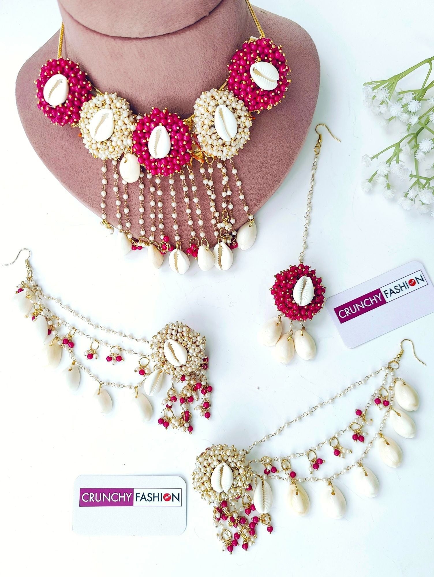 Exquisite pink & white Haldi Mehndi jewelry set with seashells & pearls, ideal for women & girls on festive occasions