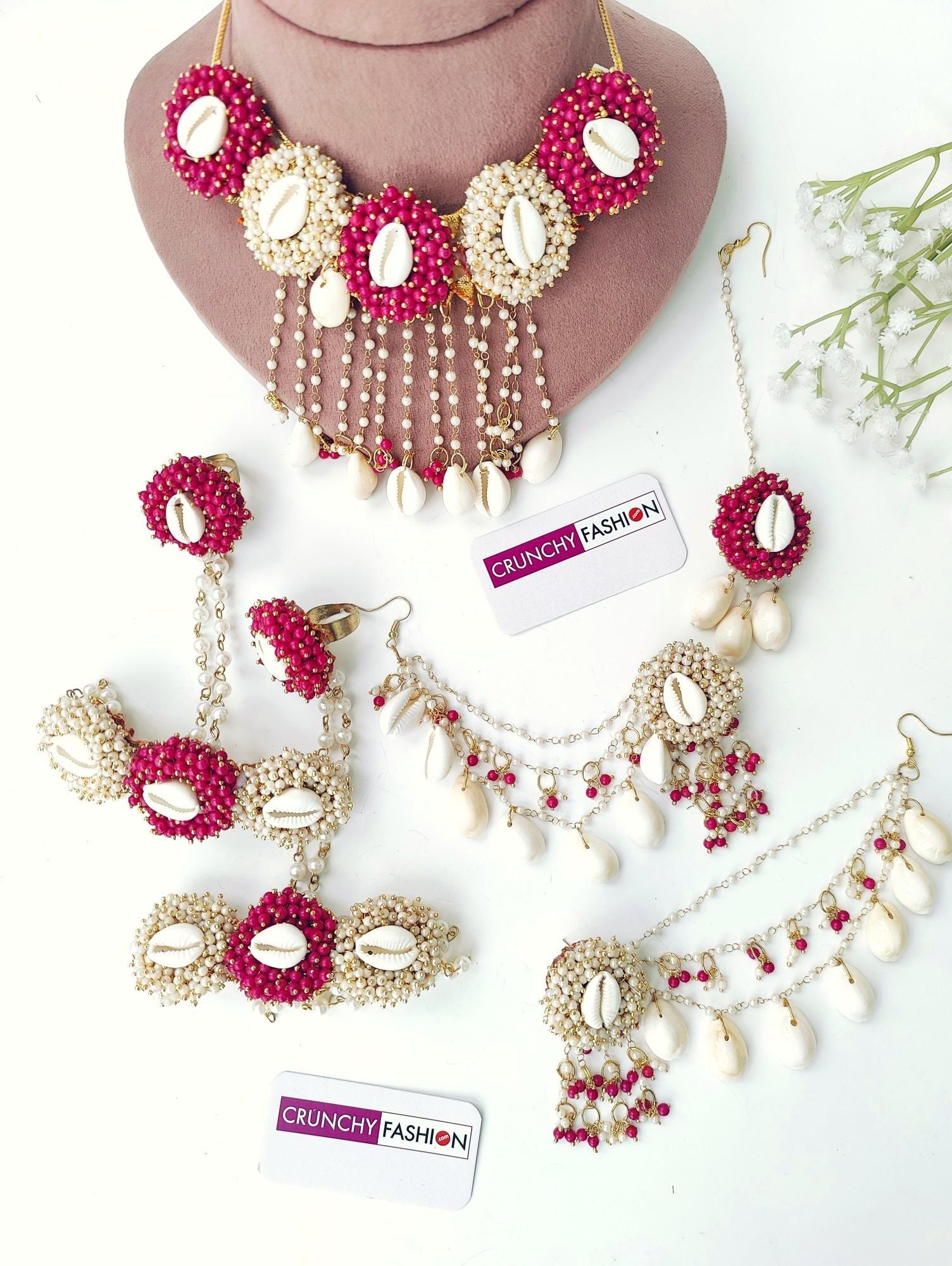 Exquisite pink & white Haldi Mehndi jewelry set with seashells & pearls, ideal for women & girls on festive occasions
