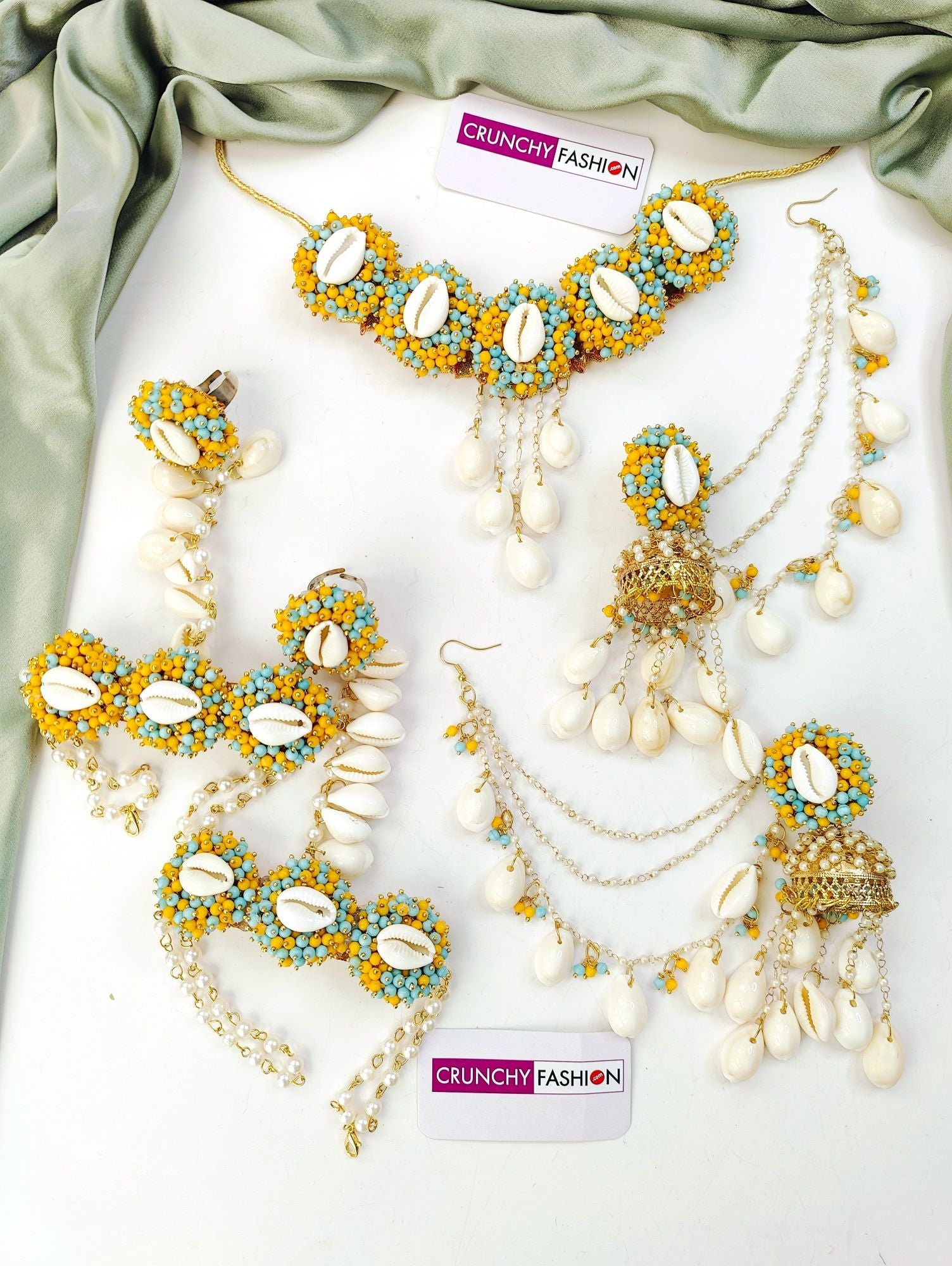 Gold-plated yellow sea shell Haldi Mehndi jewellery set with flower design for women and girls