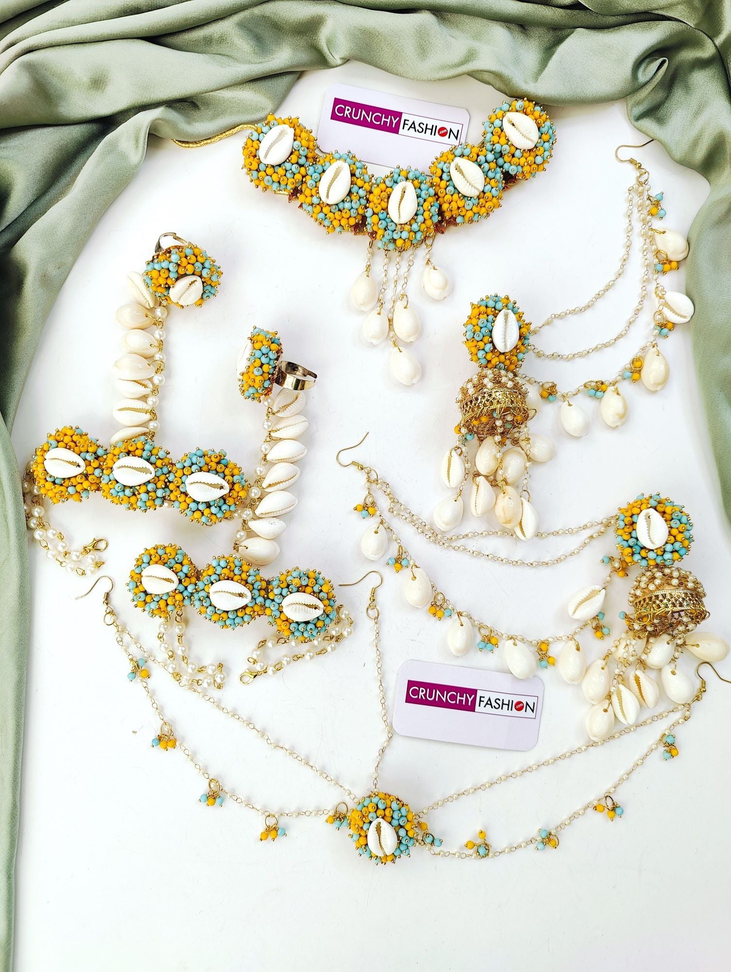 Gold-plated yellow sea shell Haldi Mehndi jewellery set with flower design for women and girls