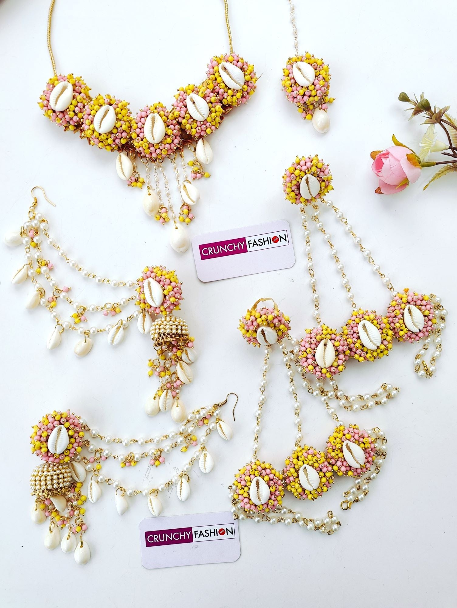 Women's Flower Design Yellow Sea Shell Haldi Mehndi Jewellery set with Gold Plating and Baby Pink accents