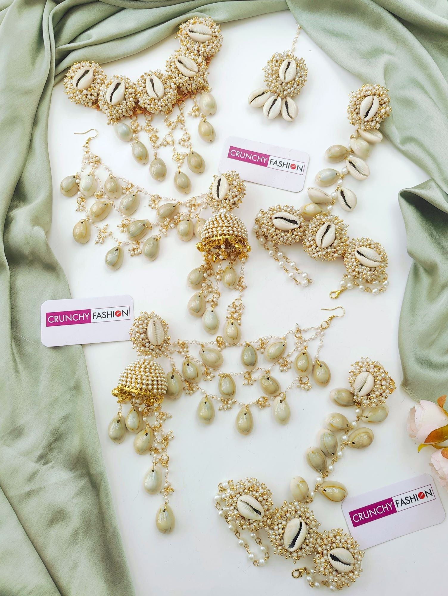 Elegant white sea shell Haldi Mehndi jewellery set with gold plating & flower design, ideal for weddings & festivals
