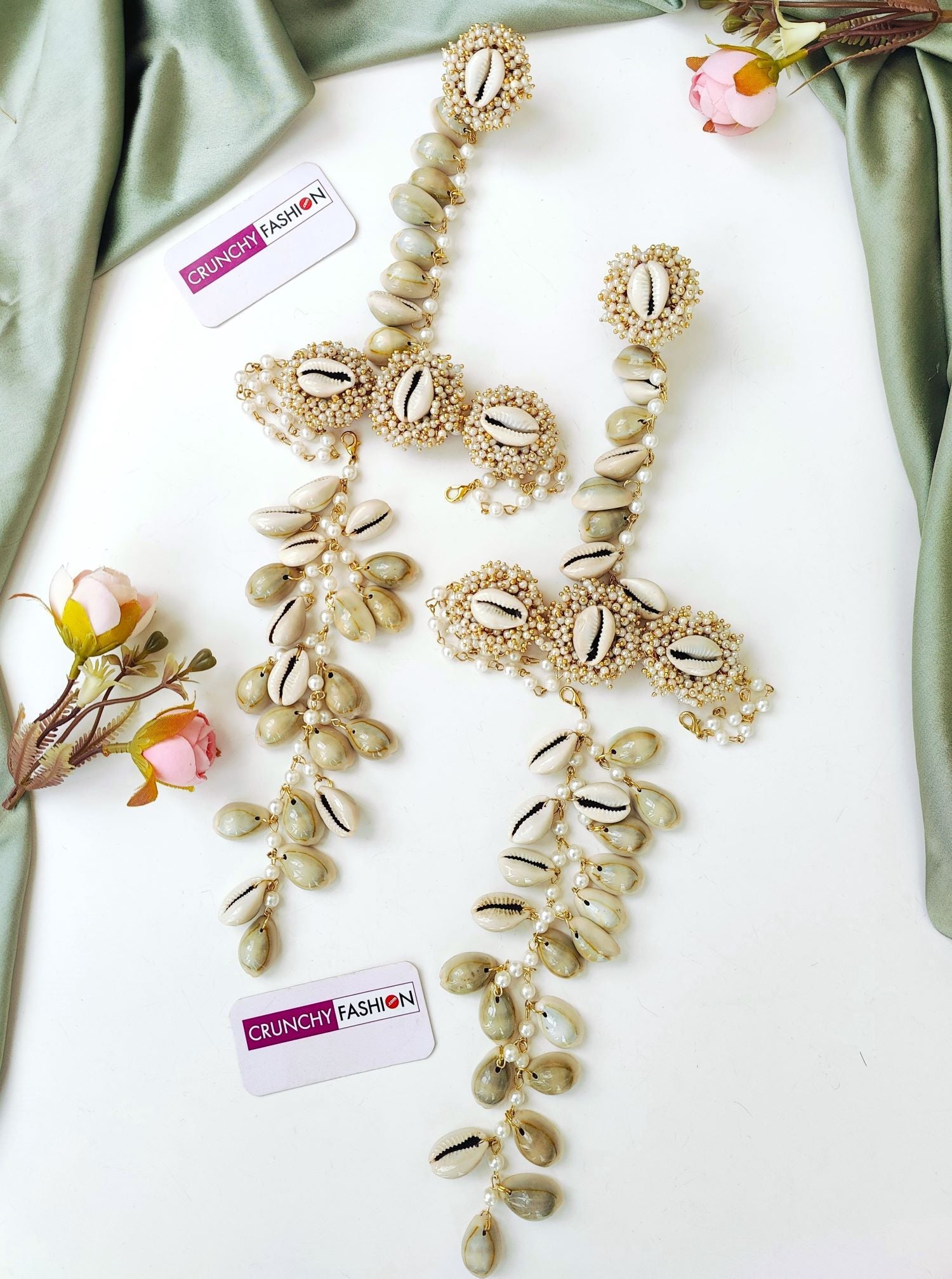 Elegant white sea shell Haldi Mehndi jewellery set with gold plating & flower design, ideal for weddings & festivals