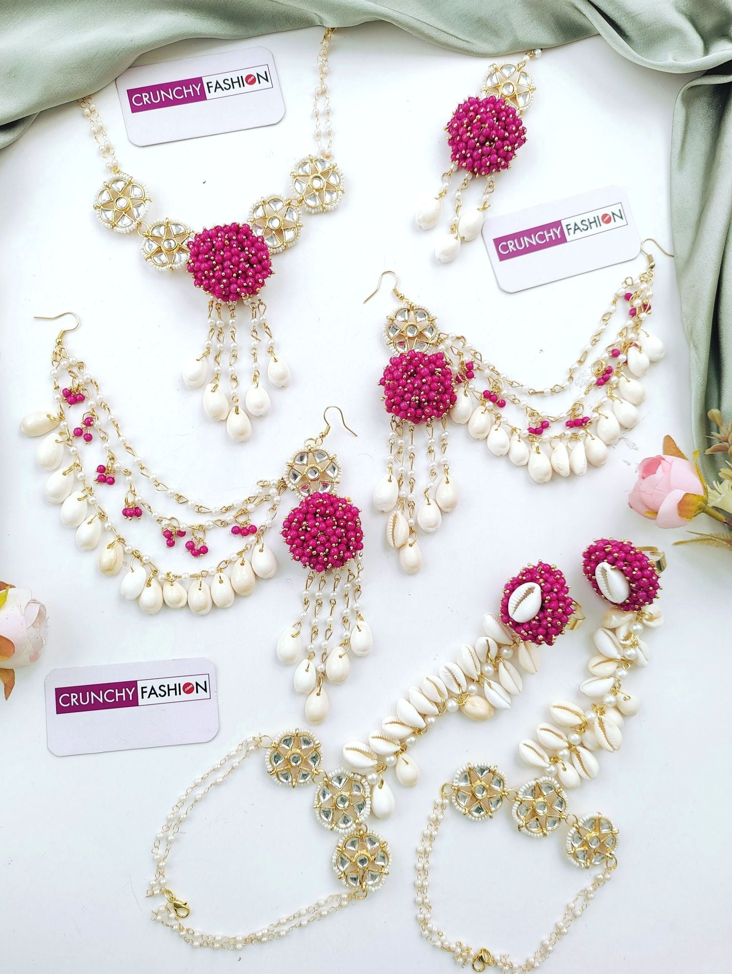 Pink seashell haldi mehndi jewelry set with kaliras for women, perfect for festive events like weddings, engagements