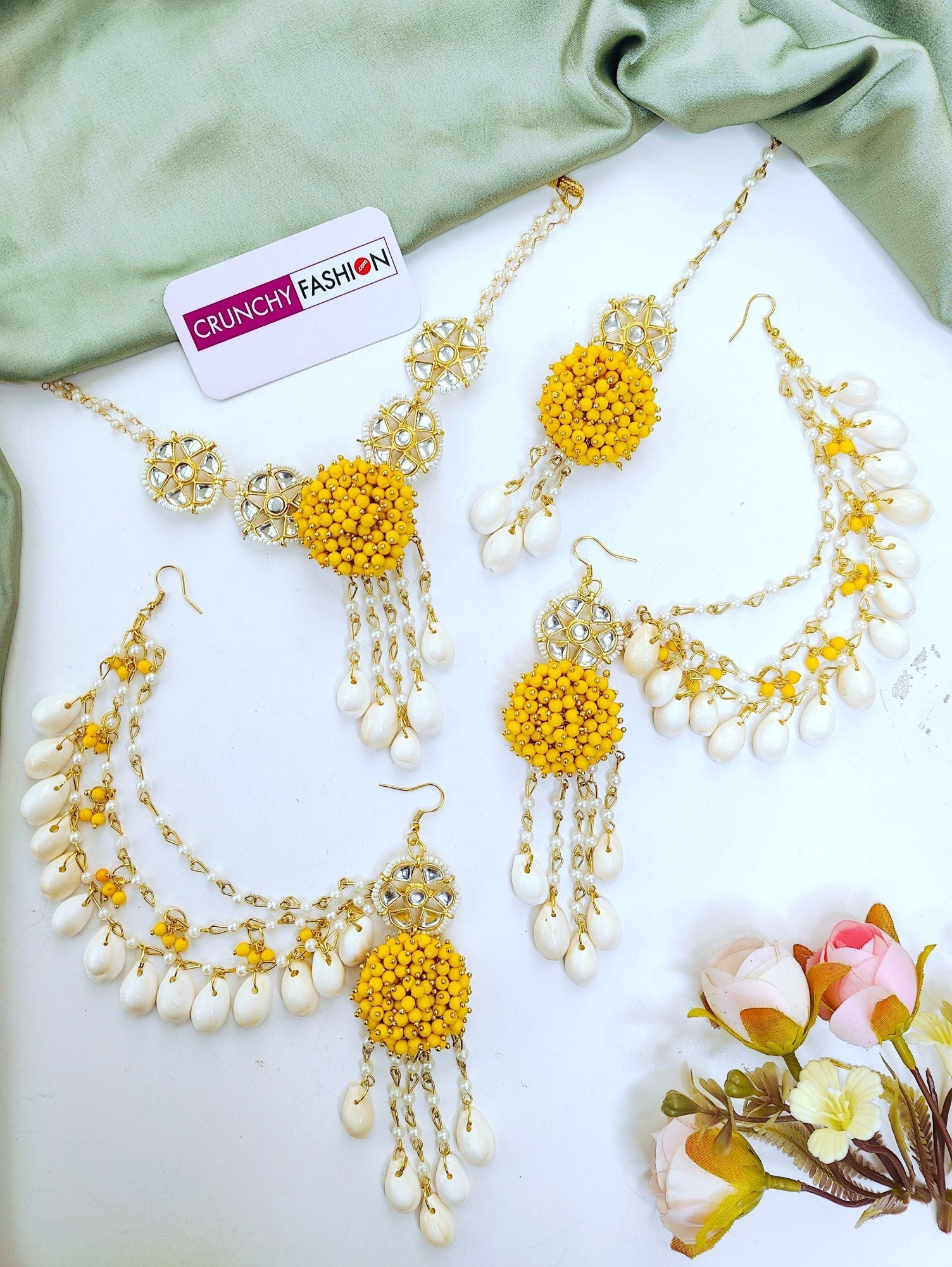 Elegant yellow pearl and sea shell flower design jewellery set with gold plating, ideal for Haldi Mehndi and festivals