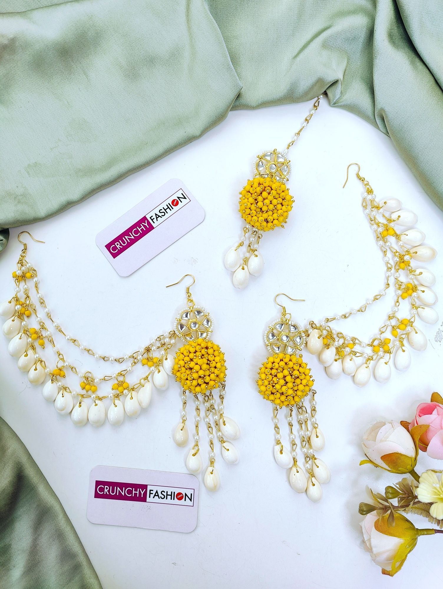 Elegant yellow pearl and sea shell flower design jewellery set with gold plating, ideal for Haldi Mehndi and festivals