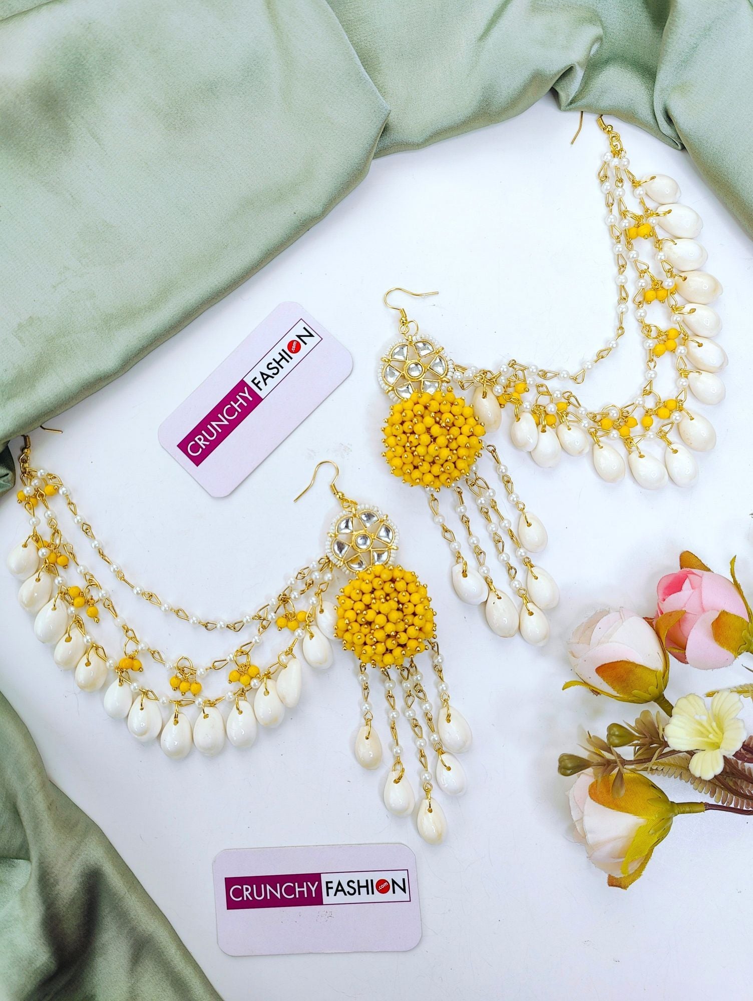 Elegant yellow pearl and sea shell flower design jewellery set with gold plating, ideal for Haldi Mehndi and festivals