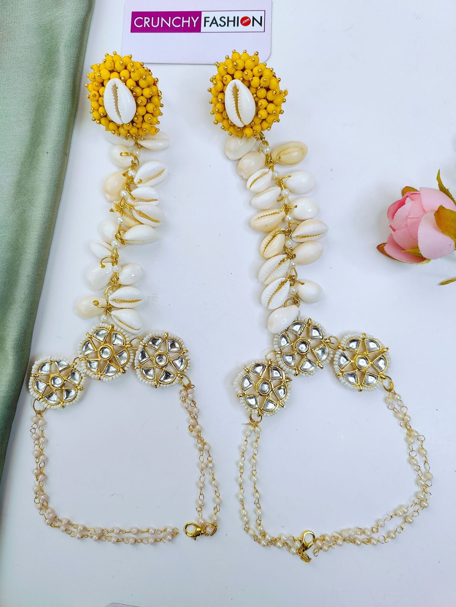 Elegant yellow pearl and sea shell flower design jewellery set with gold plating, ideal for Haldi Mehndi and festivals