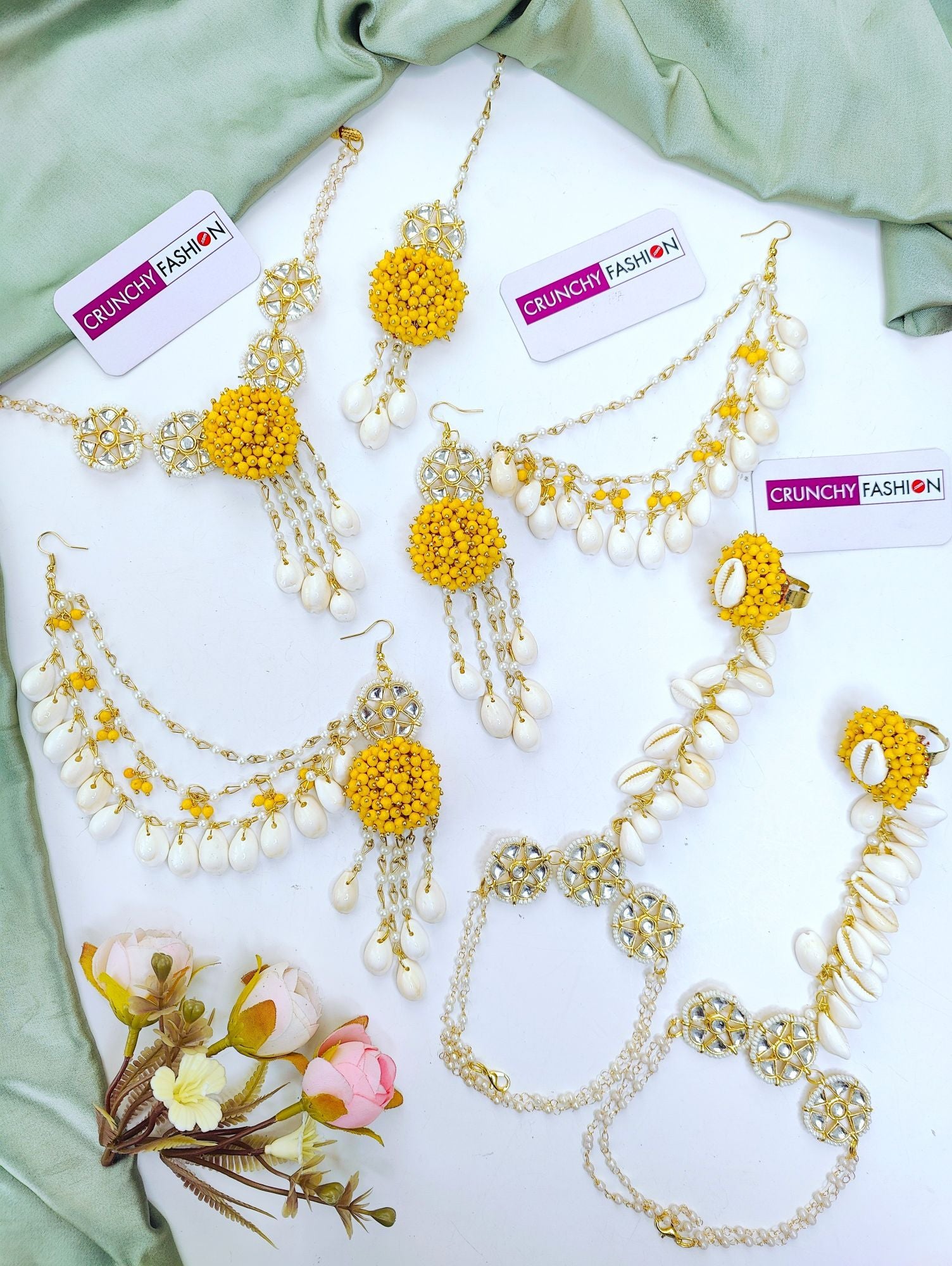 Elegant yellow pearl and sea shell flower design jewellery set with gold plating, ideal for Haldi Mehndi and festivals