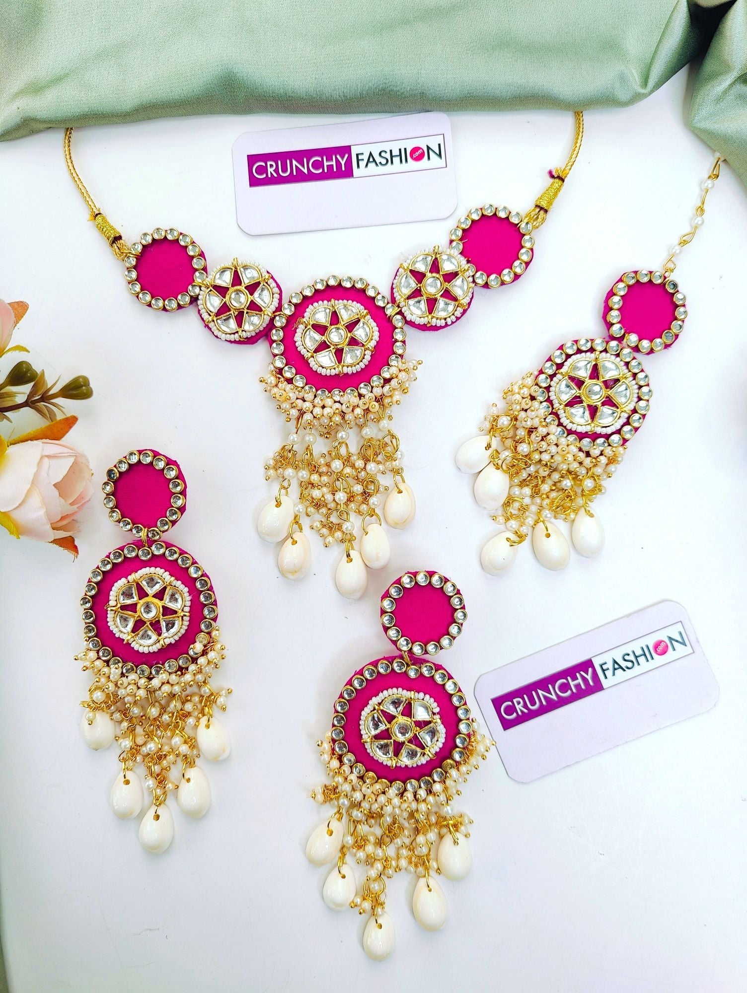 Elegant pink sea shell haldi mehndi jewellery set with gold plating for women & girls, perfect for weddings & festivals