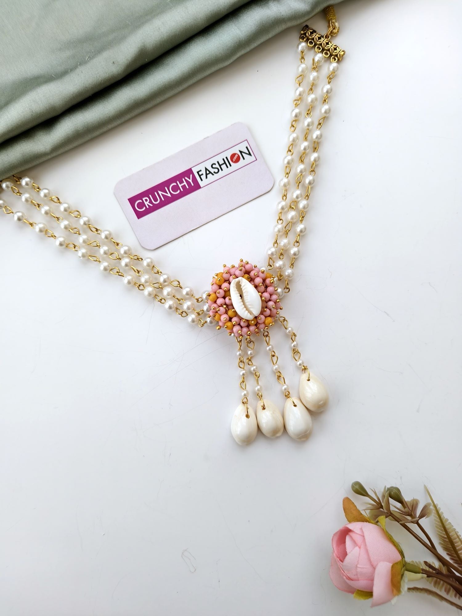 Yellow and pink haldi mehndi jewellery set with gold-plated seashells, pearls, floral design for women and girls