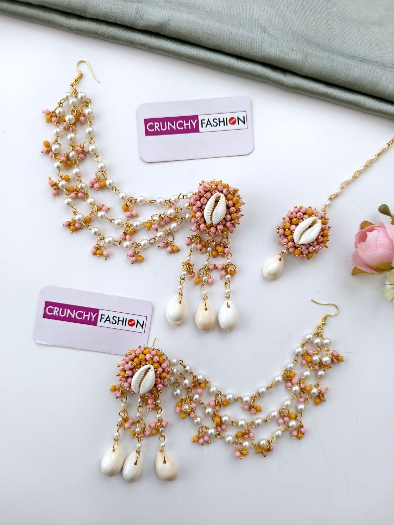 Yellow and pink haldi mehndi jewellery set with gold-plated seashells, pearls, floral design for women and girls