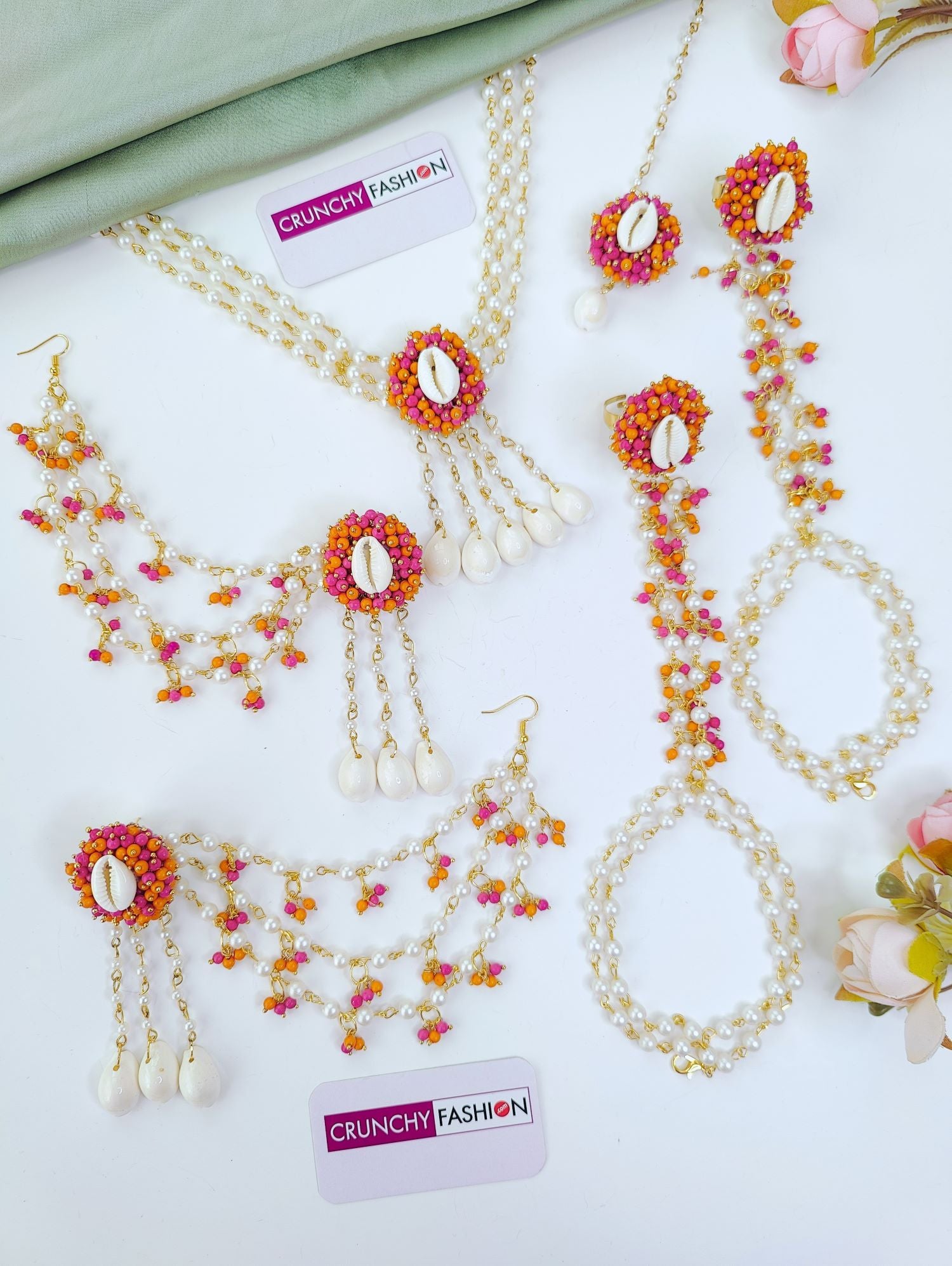 pink sea shell jewellery set for haldi & mehndi with pearls