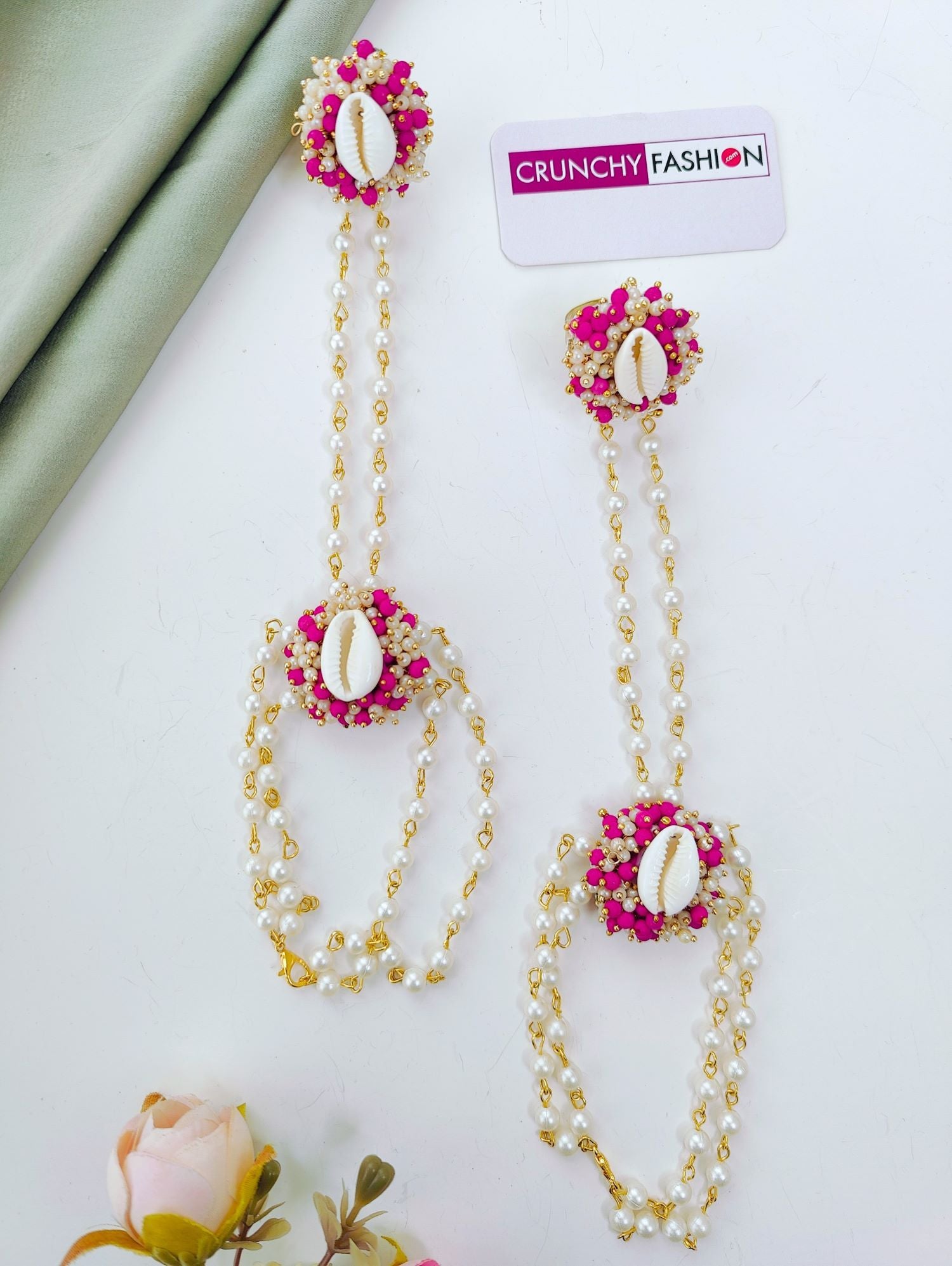 Bridal pink haldi jewellery set with sea shells, pink-white pearls; trending shell floral set for haldi-mehndi 2026