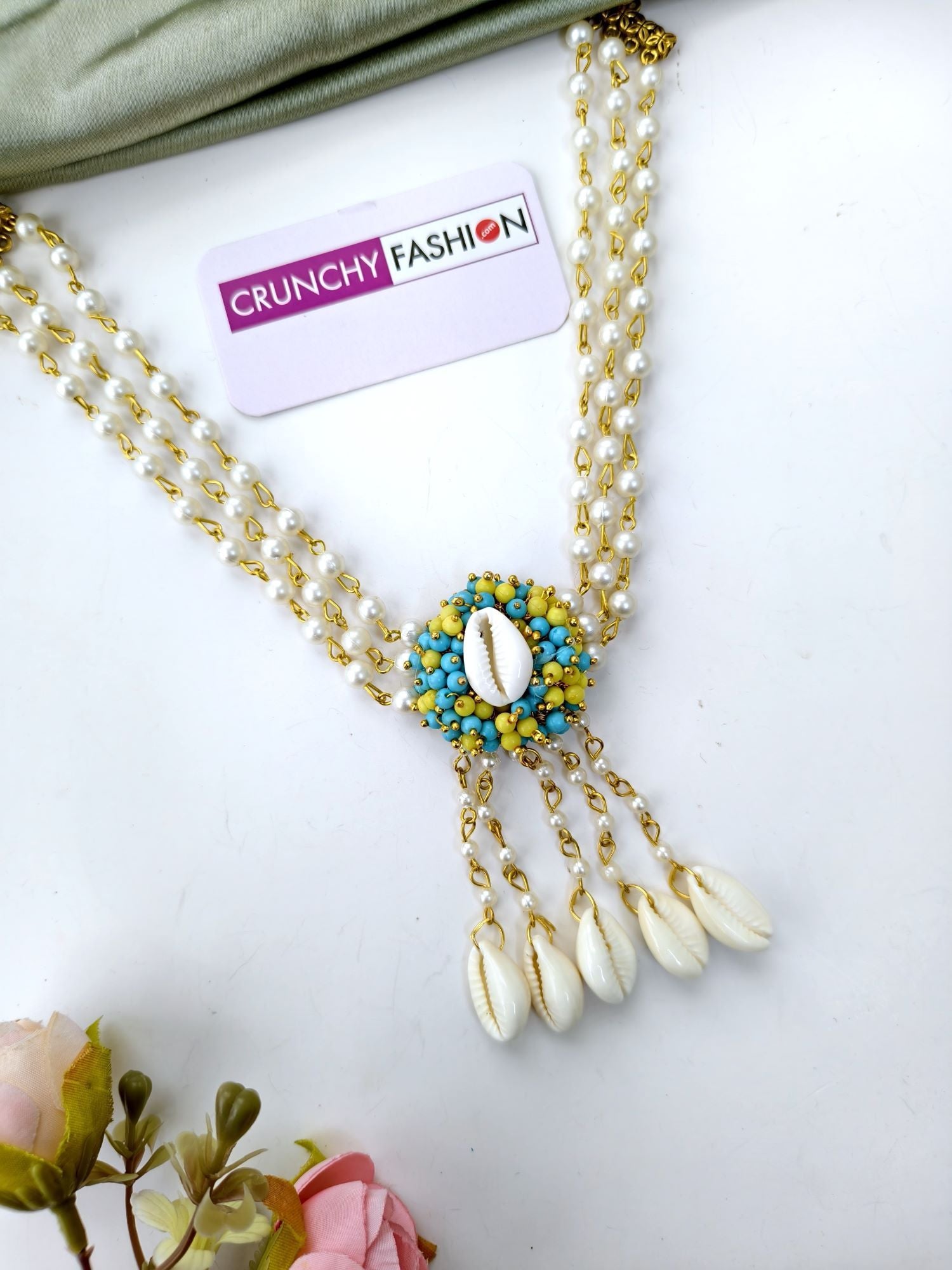 sky blue and yellow cowrie shell jewellery set for haldi mehndi
