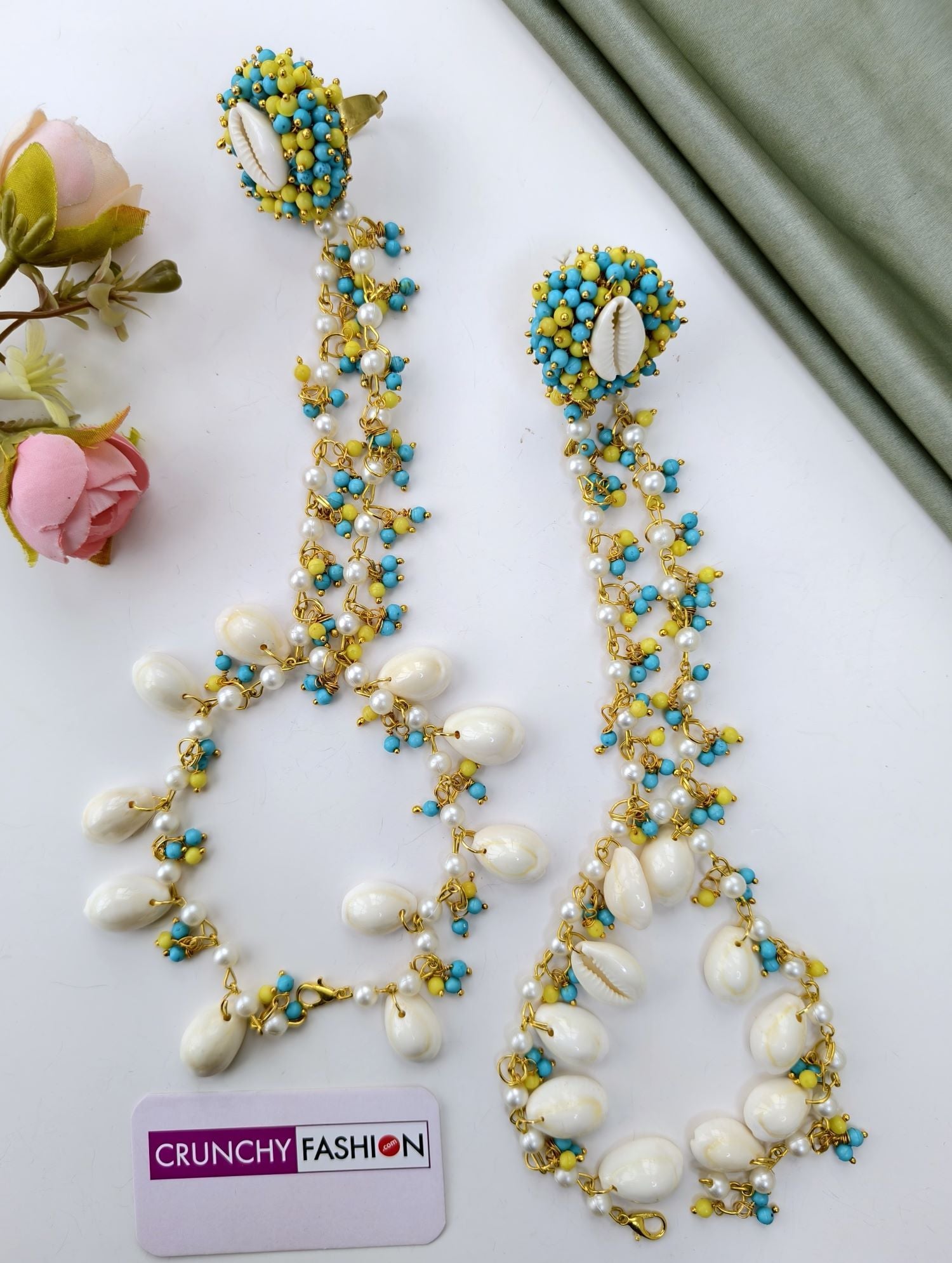 sky blue and yellow cowrie shell jewellery set for haldi mehndi