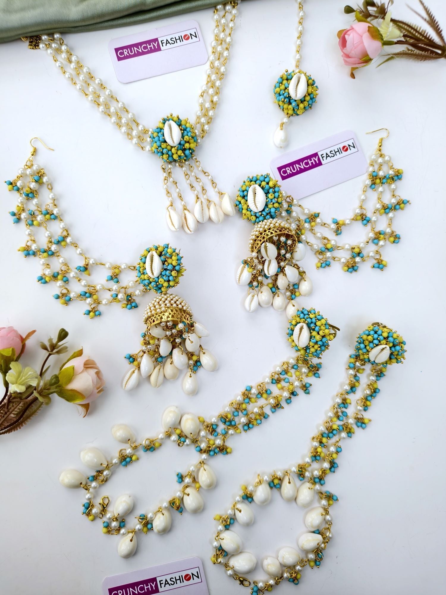 sky blue and yellow cowrie shell jewellery set for haldi mehndi