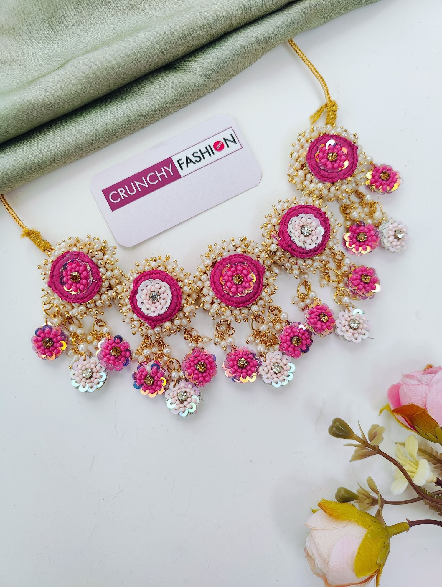 pink haldi jewellery set featuring handmade floral pieces, ideal for bridal mehendi and haldi ceremonies in 2026