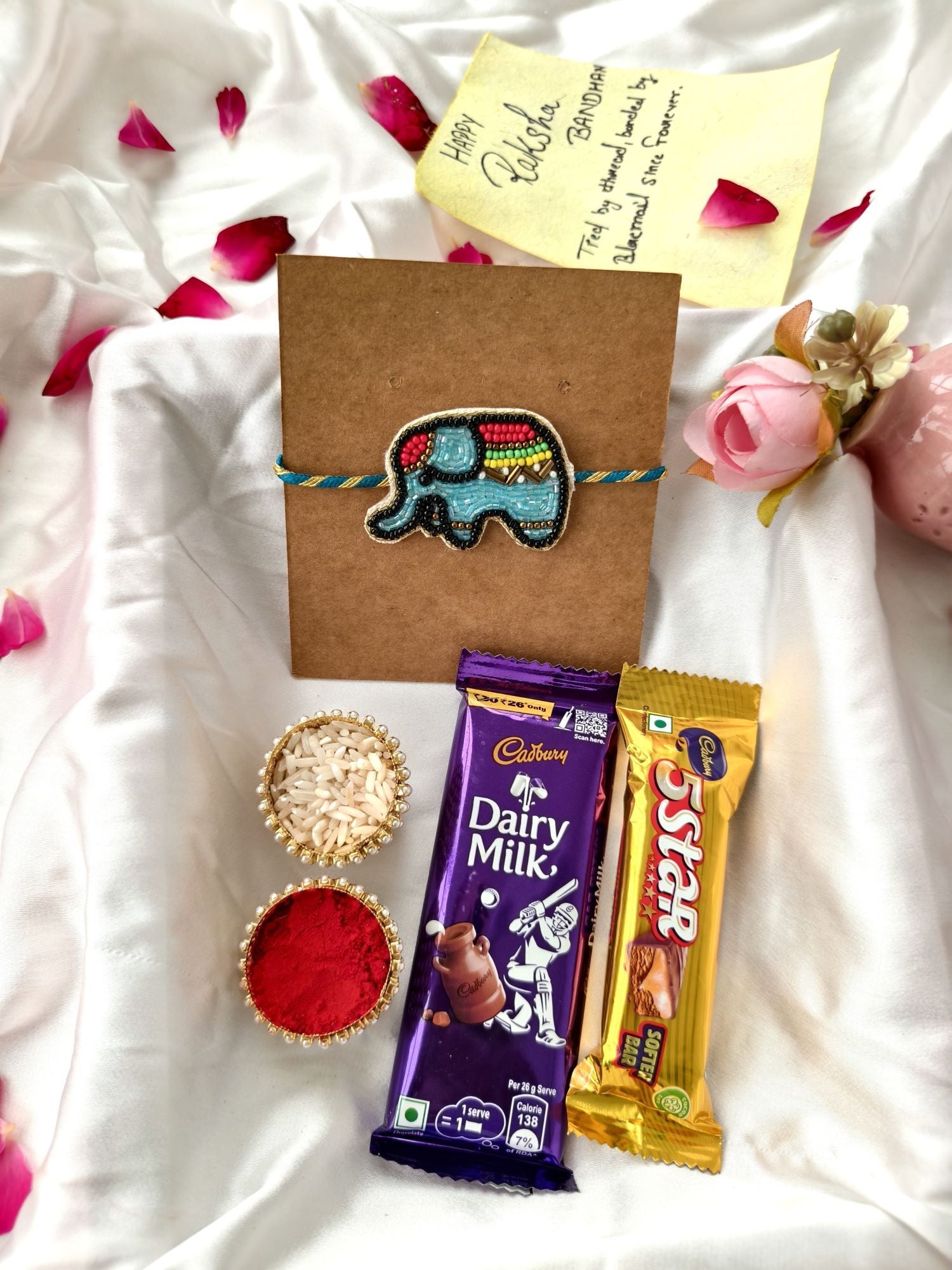 Blue elephant kids rakhi hamper with Dairy Milk, Five Star chocolate