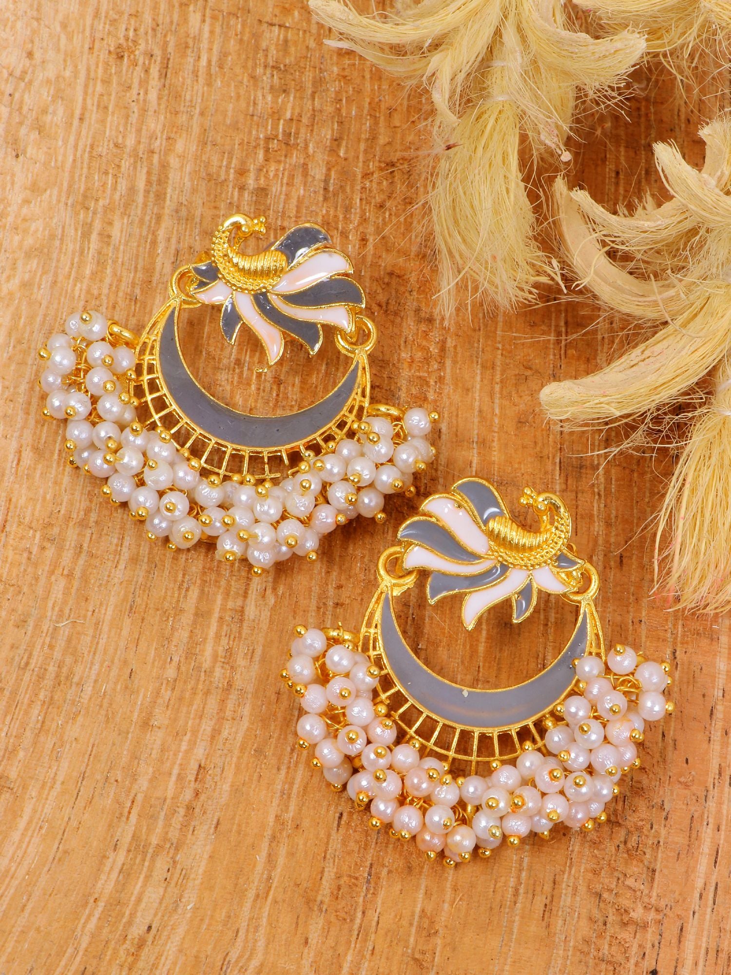 Gold plated peacock design stud earrings for girls, ideal for parties and festivals