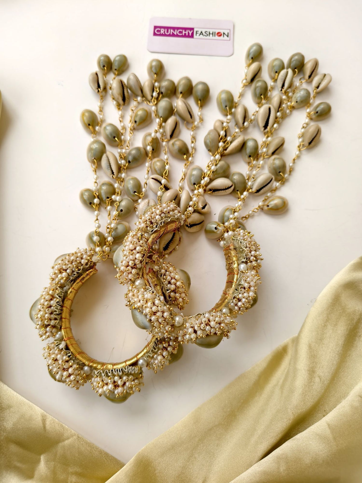 handmade seashell jewellery set for haldi mehndi brides, cowrie and pearl