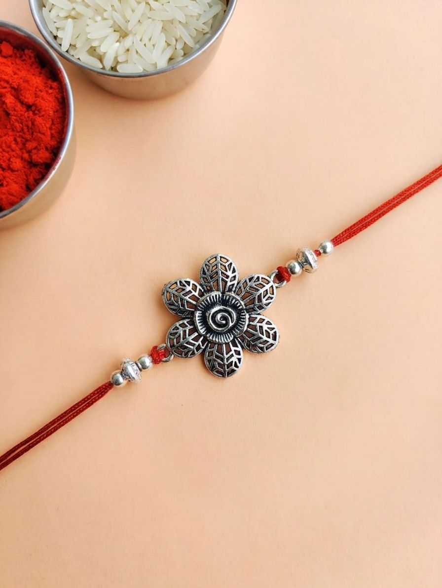 Oxidised Silver Rakhi with Engraved Flower for Brother - Traditional Silver Rakhi Design
