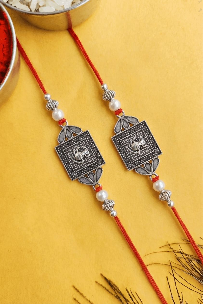 Twin Silver Oxidised Ganesh Rakhi Set of 2 for Brothers 2026