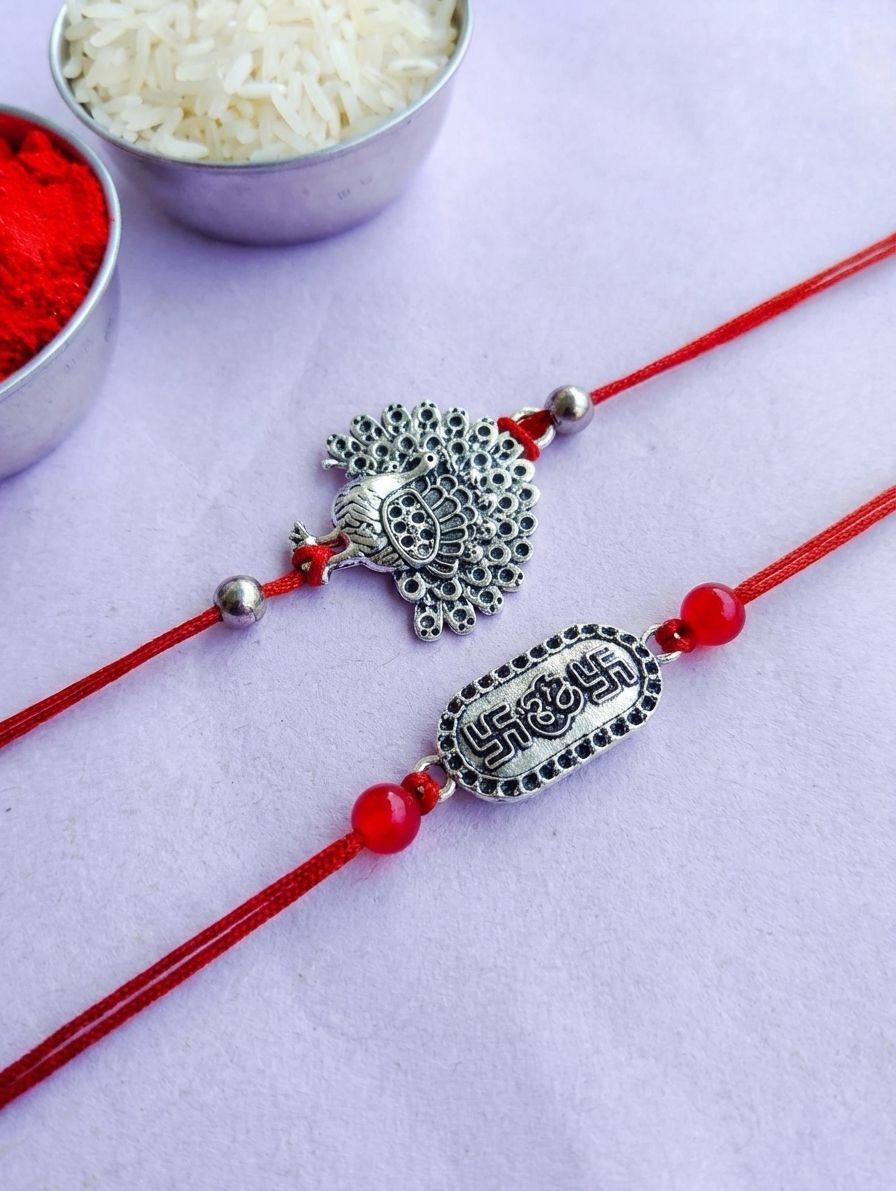 Oxidised Silver Peacock Om Rakhi 2026 for Brother & Bhabhi Set