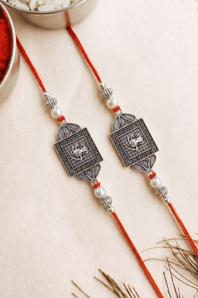 Twin Silver Oxidised Ganesh Rakhi Set of 2 for Brothers 2026