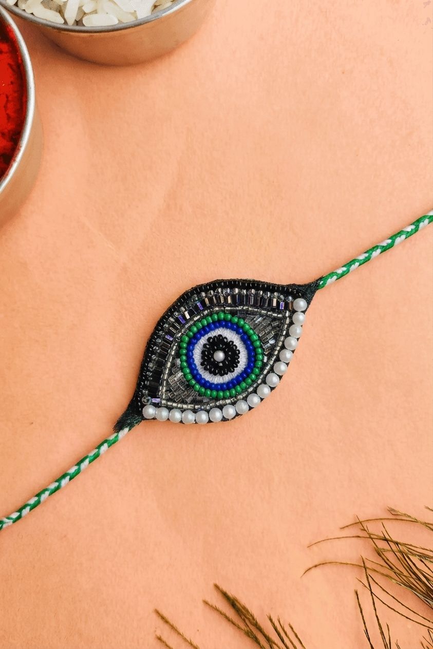 Evil Eye Enchantment: Handcrafted Rakhi for Brother
