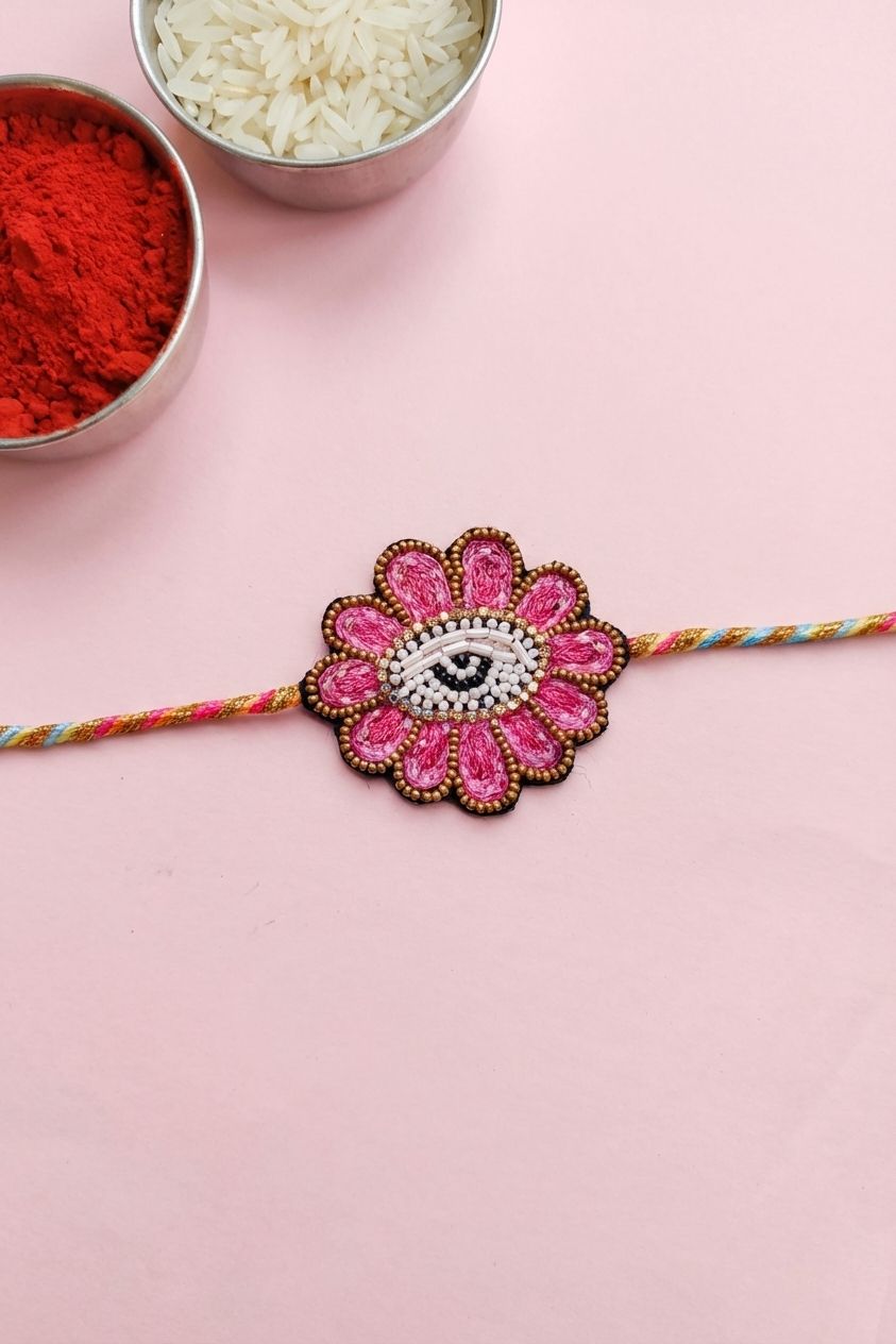Handmade Pink Beaded Rakhi Gift for Brother – Floral Evil Eye Rakhi 2026