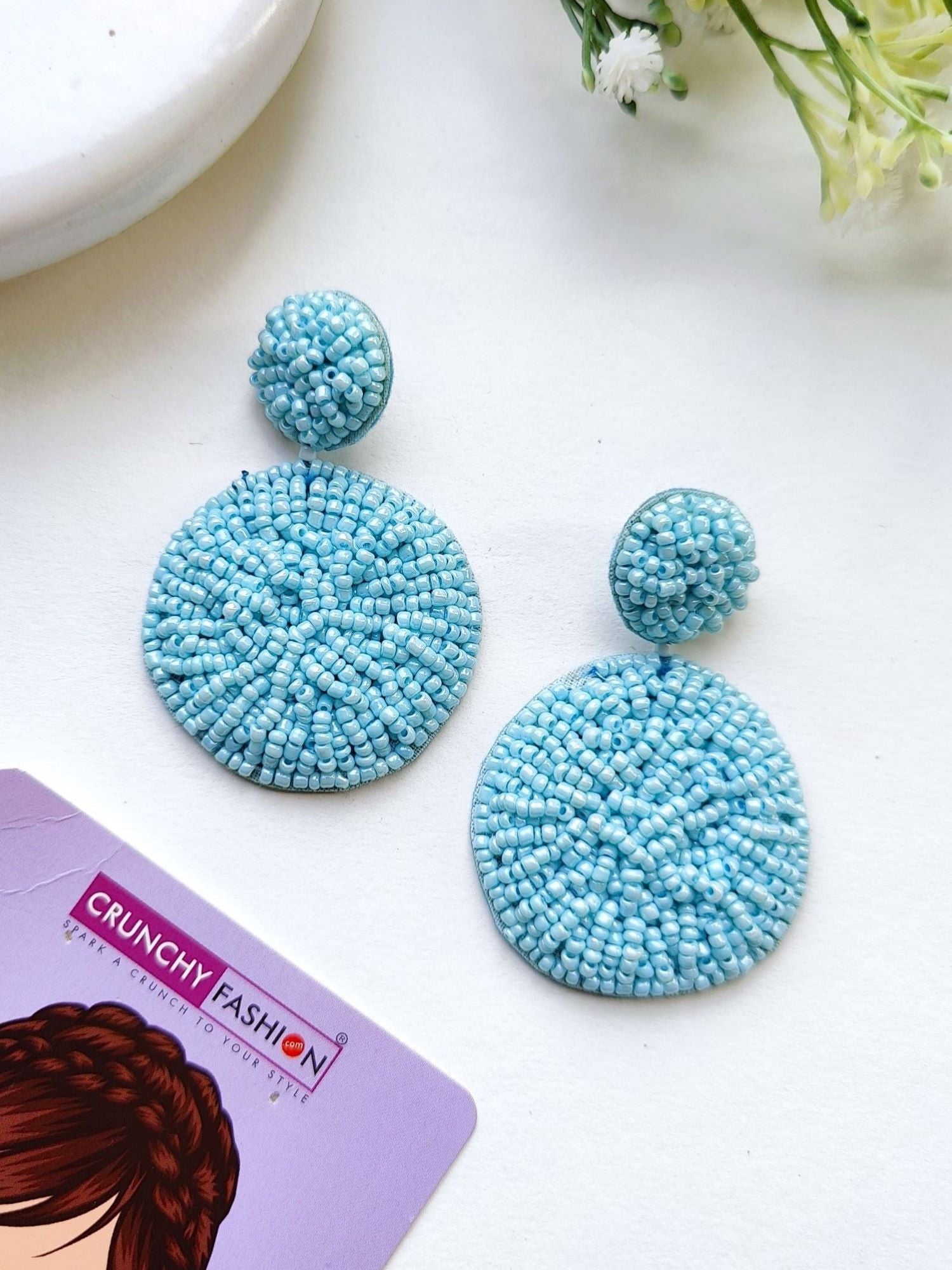 Handcrafted Sky Blue Beaded Danglers: A Fashionista's Statement Earrings