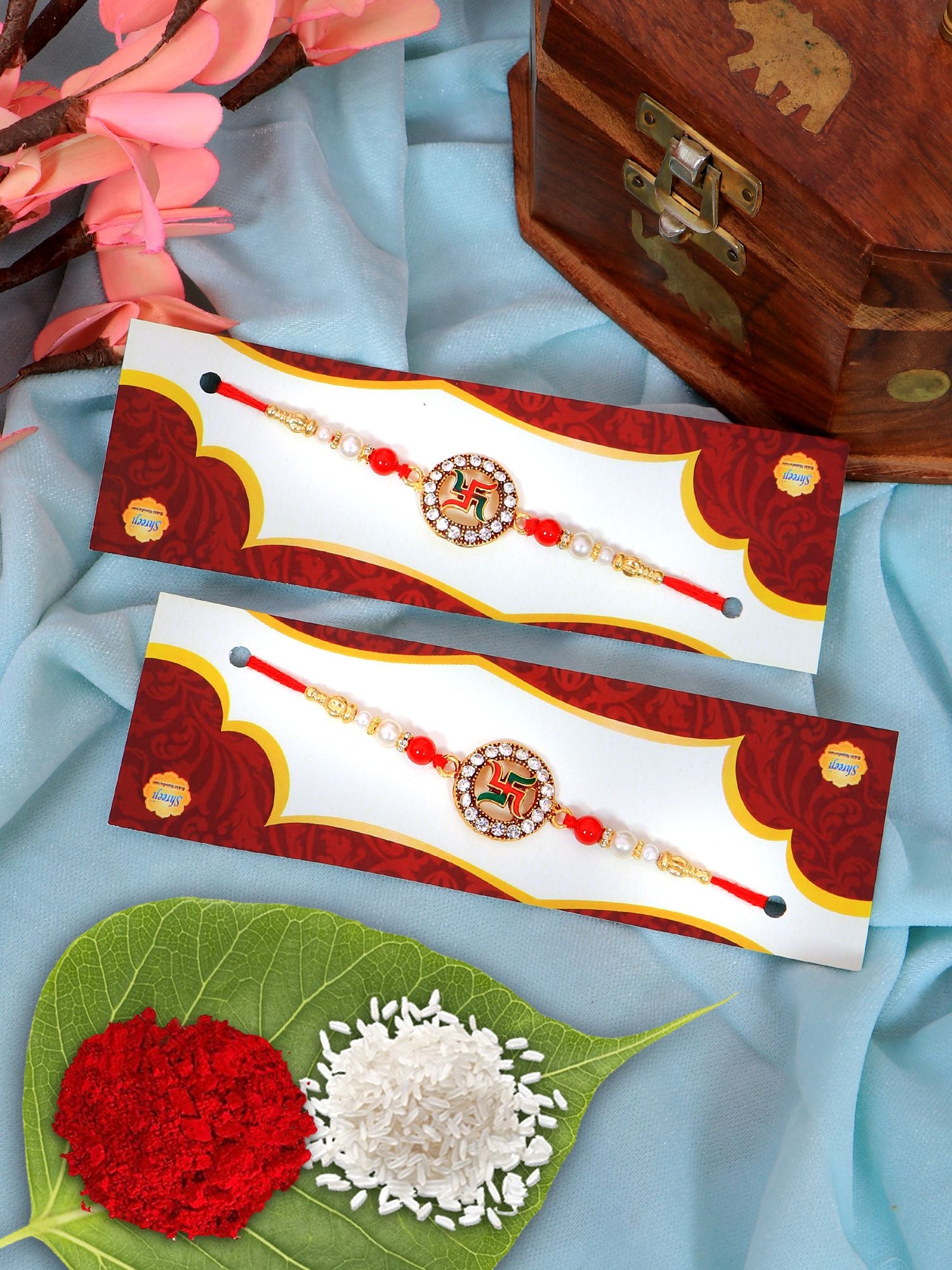 Classy Gold-Plated Swastik Rakhi Set for Raksha Bandhan