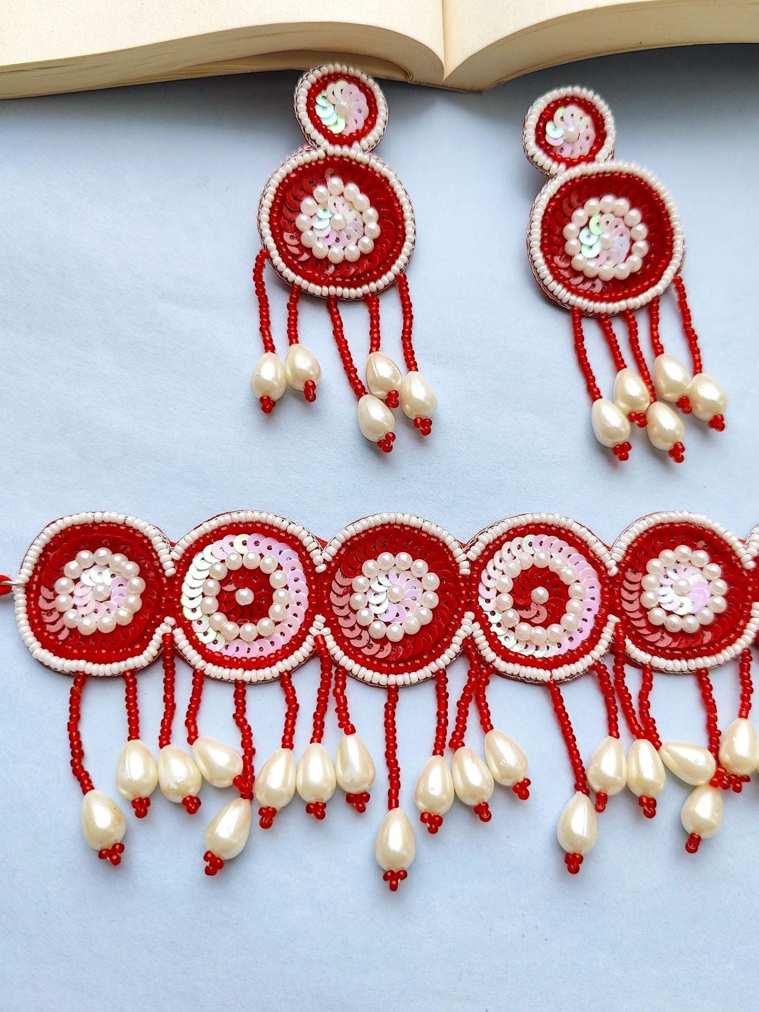 Handcrafted Red-White Beaded Quirk: Lightweight Choker Set for Fashion-forward Girls