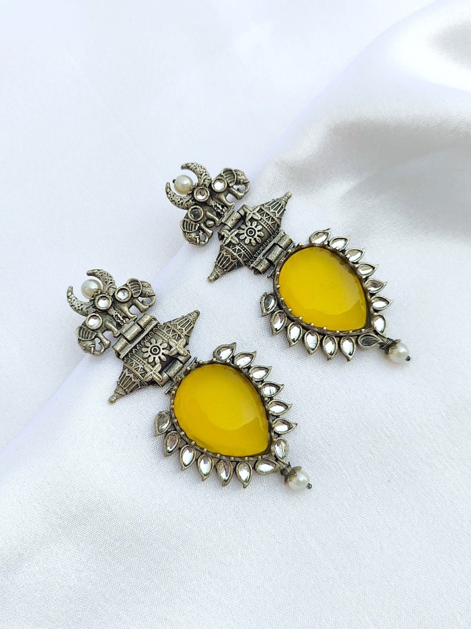Radiant Yellow Oxidized Party-Wear Earrings with Elephant Motifs