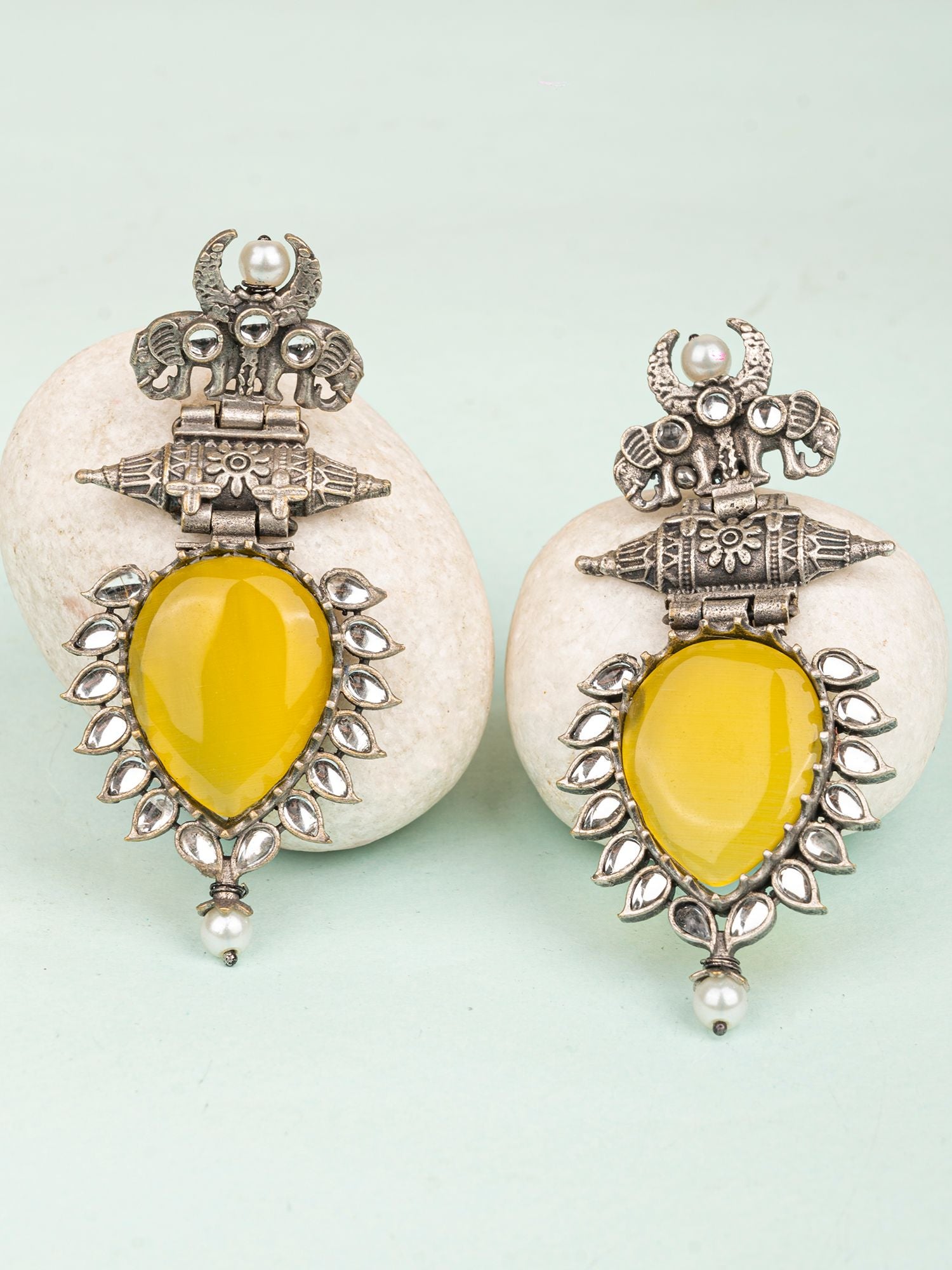 Radiant Yellow Oxidized Party-Wear Earrings with Elephant Motifs